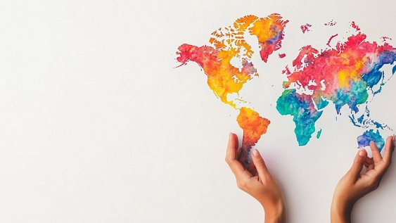 Colorful Watercolor World Map in Hands Global Unity, Travel, and Exploration Design