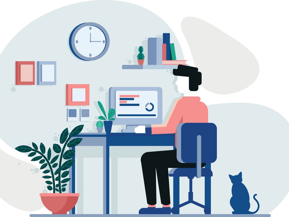 Person sitzt vor dem Computer am Schreibtisch