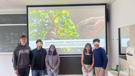 Group photo of 5 people.