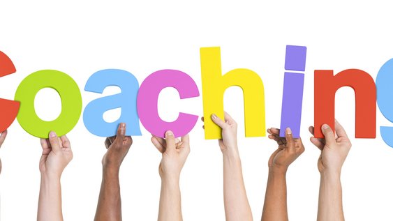 Diverse Hands Holding The Word Coaching