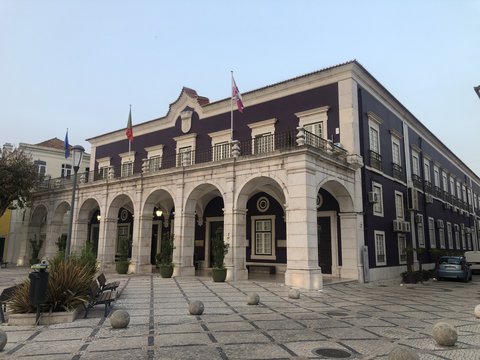 A town square with a university building