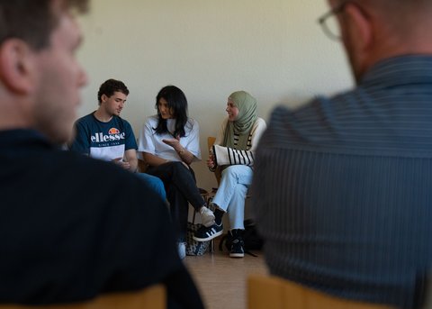 View of a group of students in a workshop (opens enlarged image)